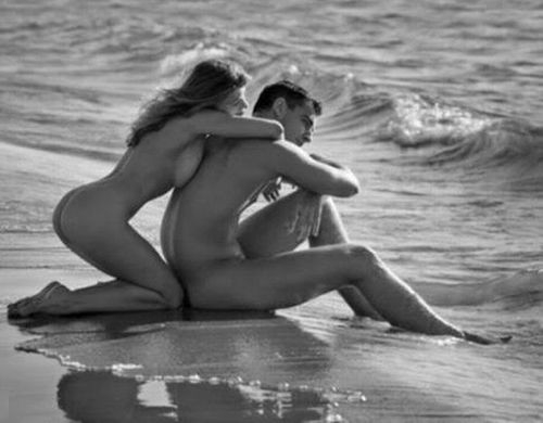 nudist couple; Outdoor Natural Beach 